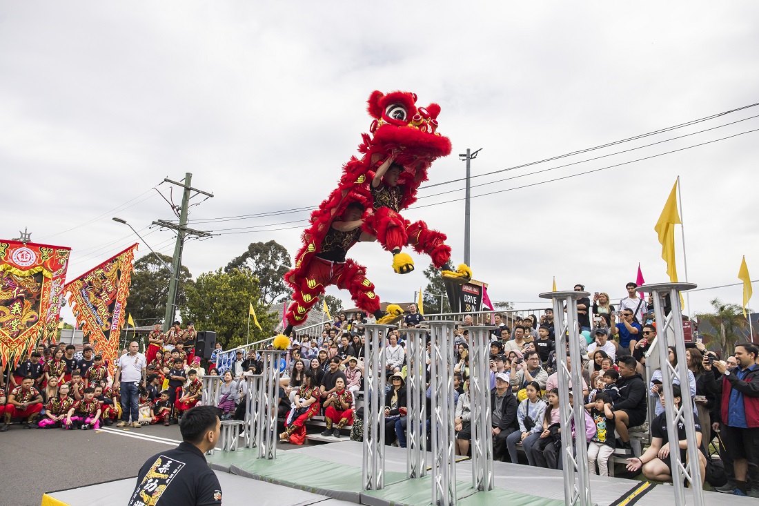 2024-Cabramatta-Moon-Festival-Yun-Yee-Tong-lion-on-poles-by-Anna-Kucera.jpg