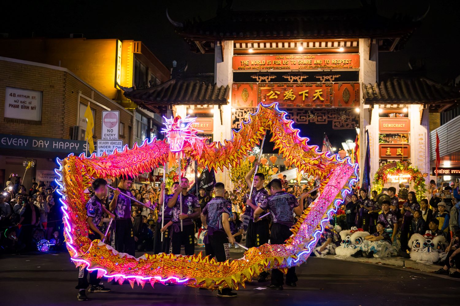 Dancing dragon in circle at night