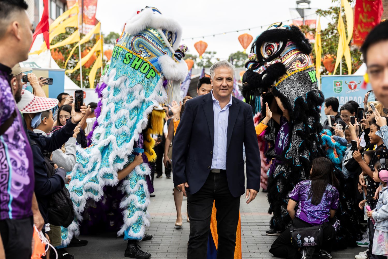 The Mayor walk pass to Lion Dancing crews